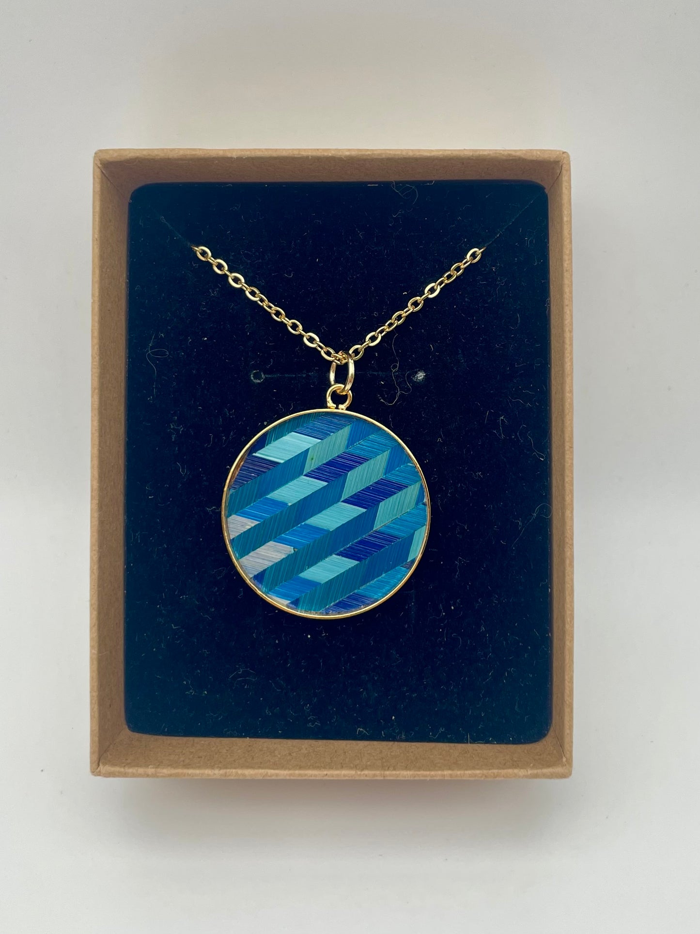 Pendentif médaillon (plusieurs coloris)