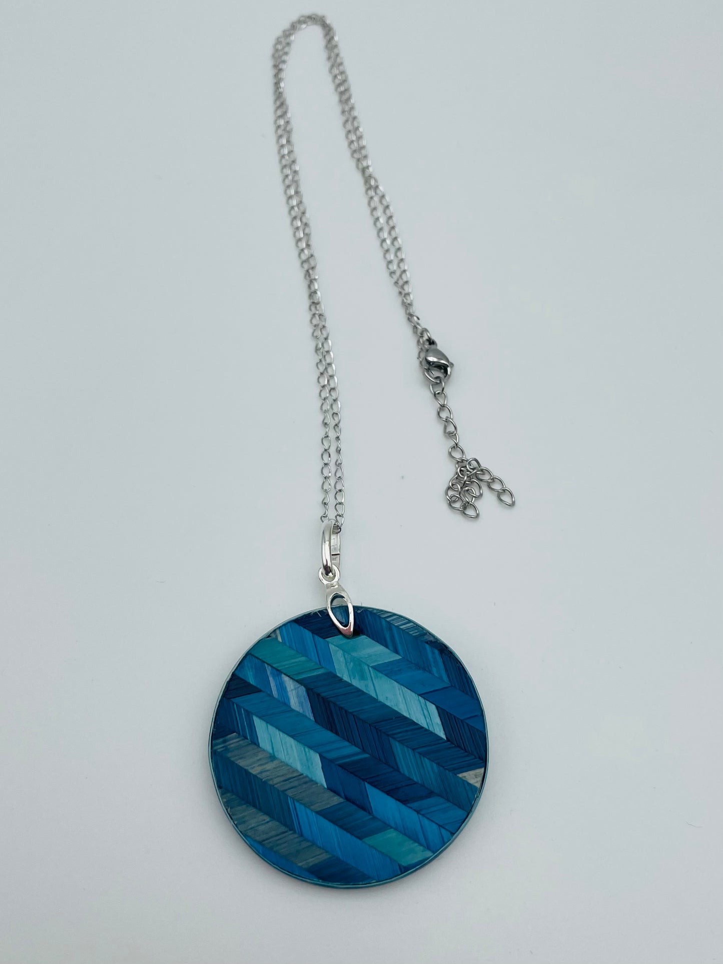 Pendentif rond chevron